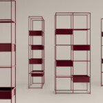 Red shelving units on neutral background