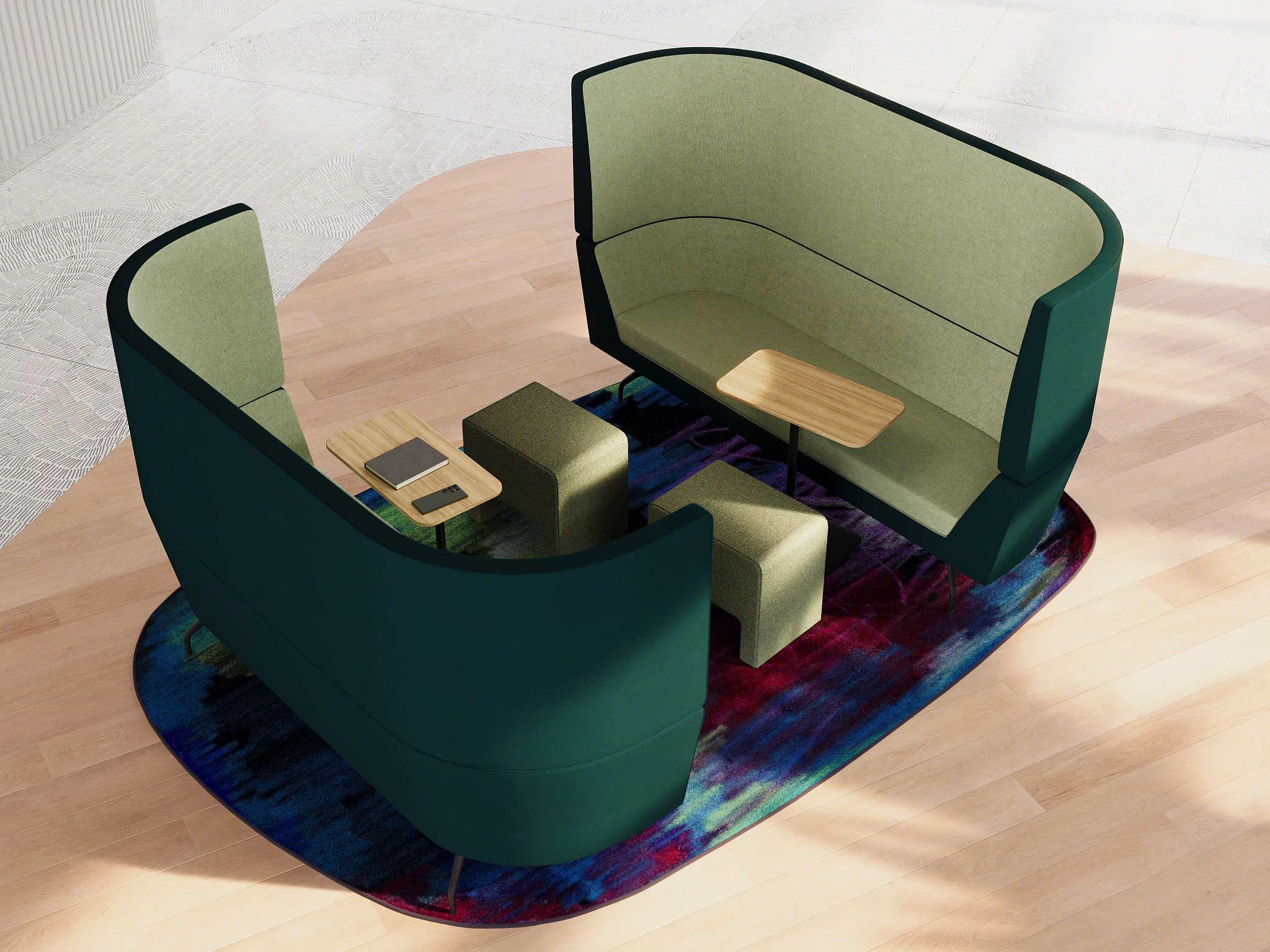 Modern collaborative lounge setup with two green high-back sofas, integrated tables, and ottomans