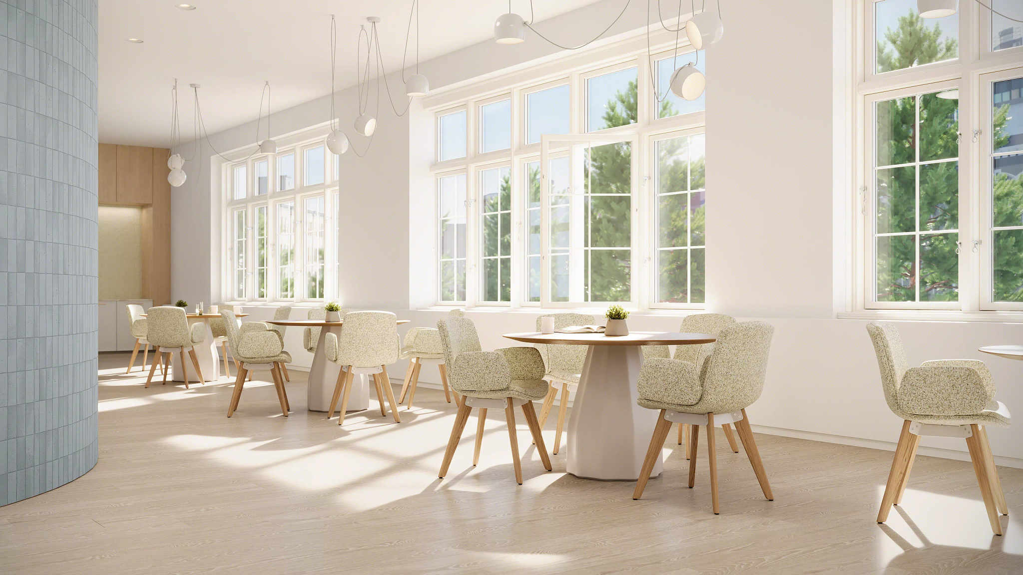 Modern round dining table with upholstered chairs and wood legs