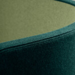 close-up of green high-back lounge sofa
