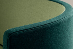 close-up of green high-back lounge sofa