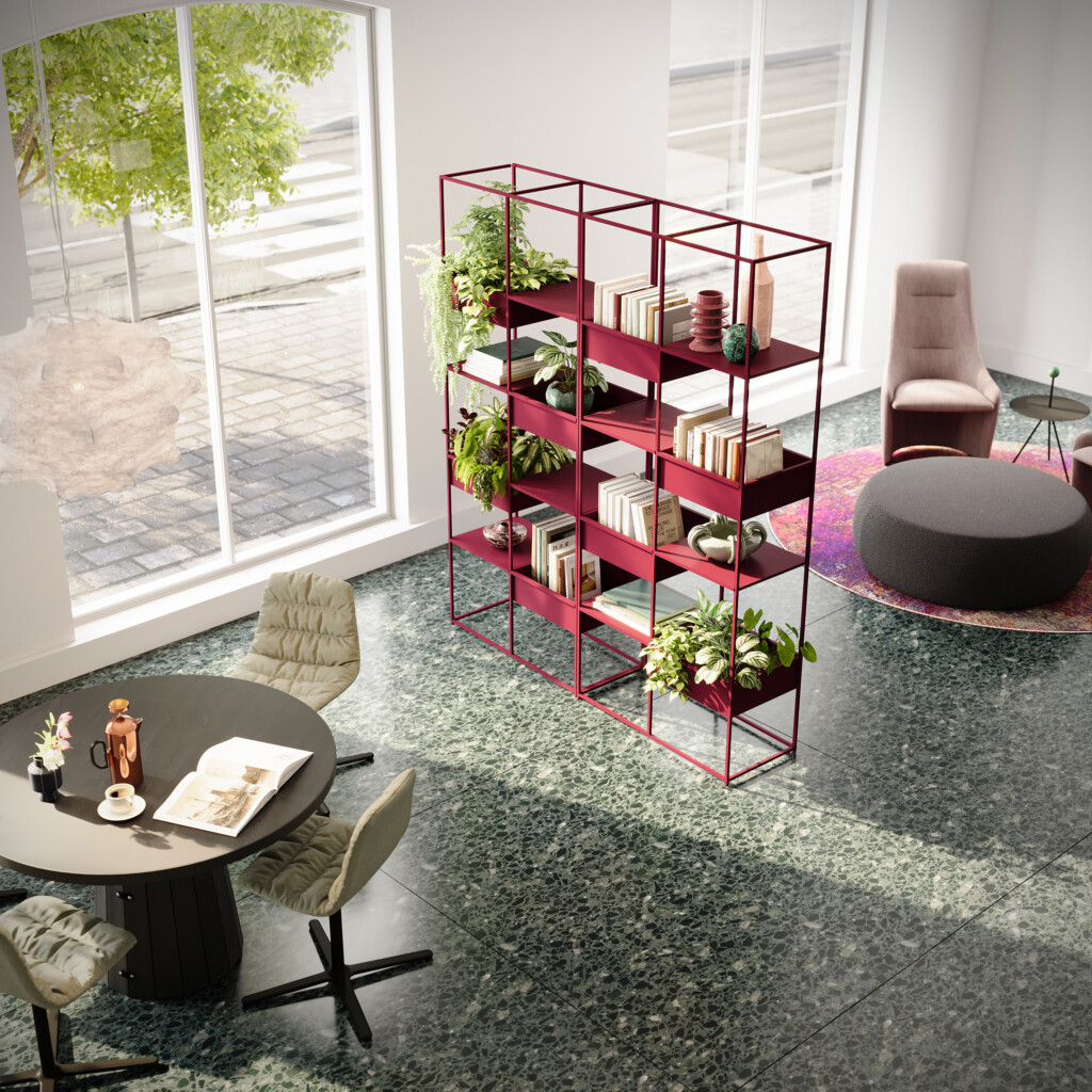 Modern interior space with dining table, upholstered chairs, red shelving unit, and lounge seating