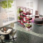 Modern interior space with dining table, upholstered chairs, red shelving unit, and lounge seating