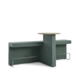 modern upholstered bench and integrated wood table against neutral background