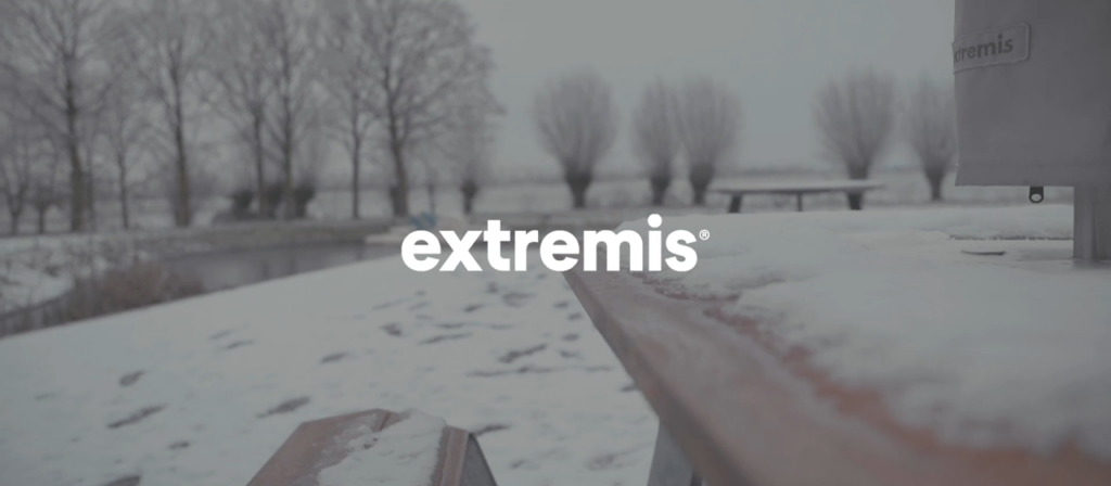Snow‑covered outdoor bench image for partner brand Extremis