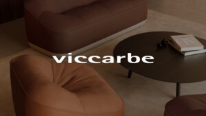 Modern living room scene with lounge seating and a round coffee table for partner brand Viccarbe