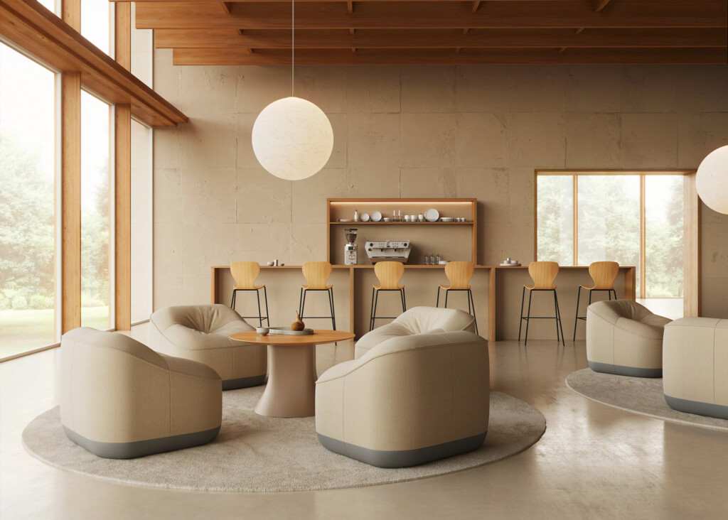 Modern lounge seating area with rounded armchairs and café bar