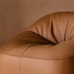 Brown upholstered lounge chair