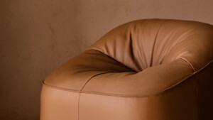 Brown upholstered lounge chair