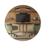 Modern conference room with two swivel chairs, center table, and wall-mounted screen