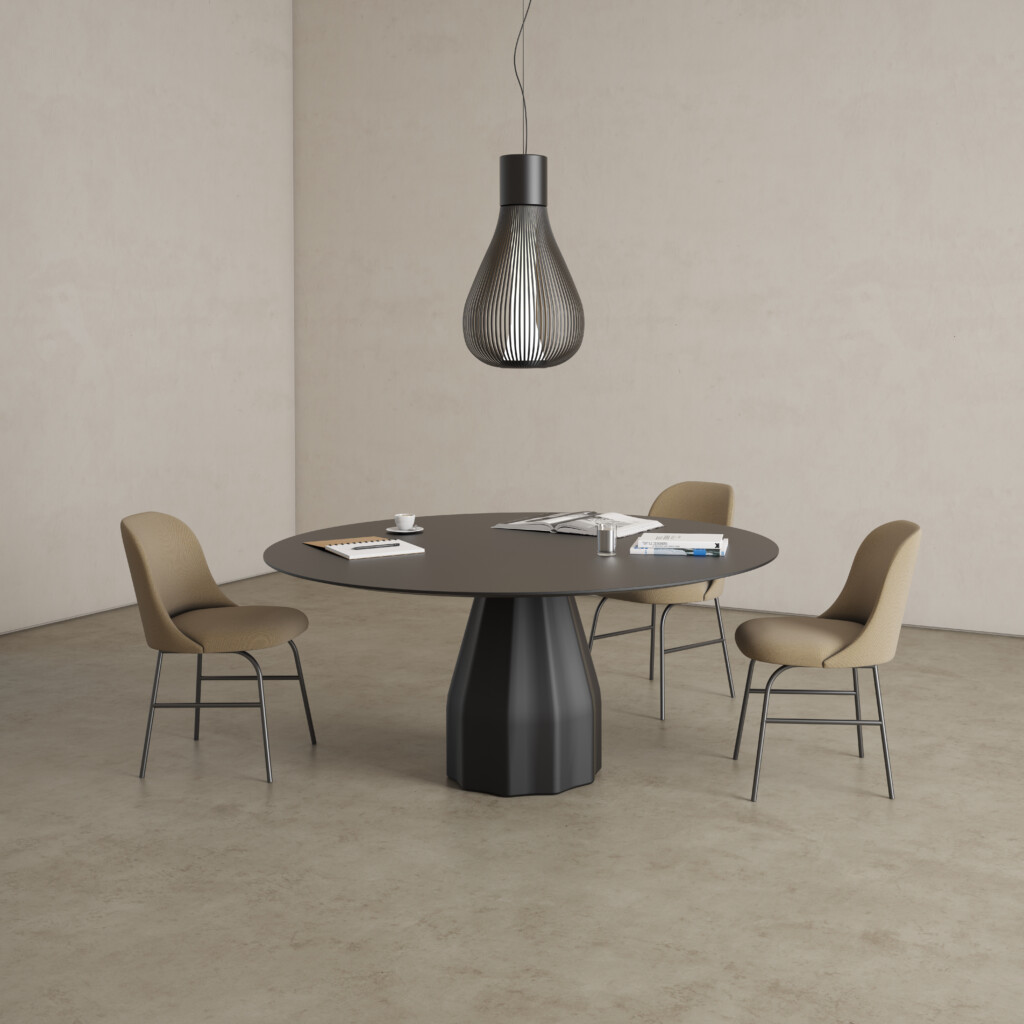 Round table with three upholstered armless chairs.
