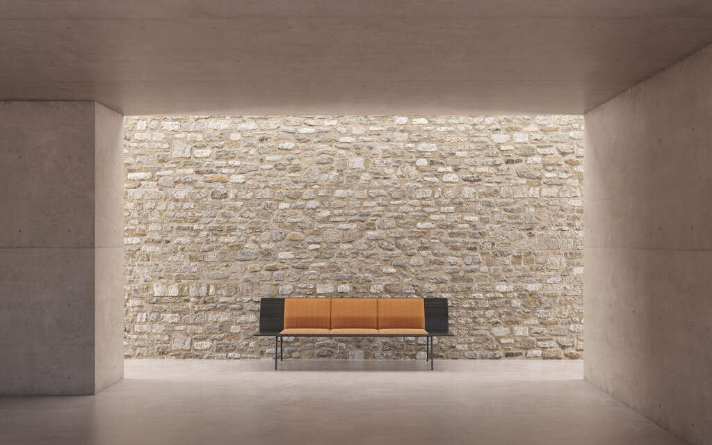 Wooden bench inside brick wall space
