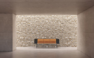 Wooden bench inside brick wall space