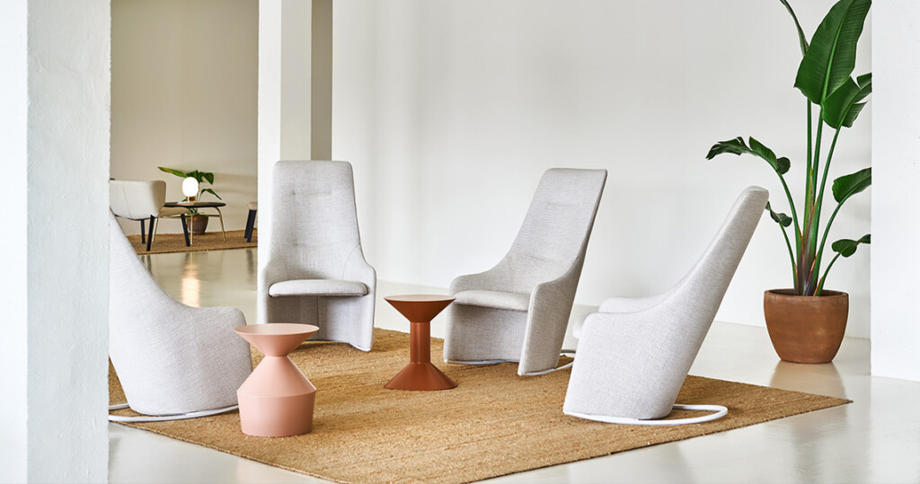 Four chairs arranged around a coffee table