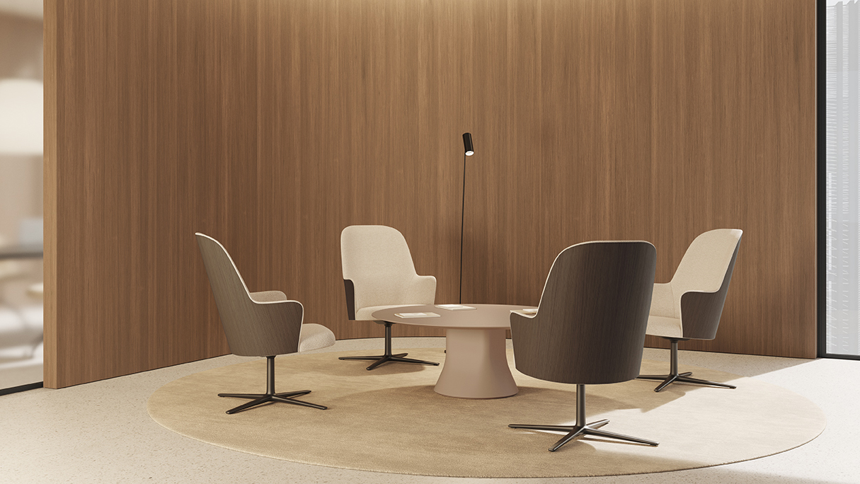 Four chairs arranged around a coffee table with a wooden backdrop