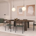 Perxa chairs around a large round table.