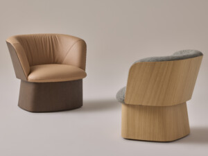 Set of two manto lounge chairs against a beige background