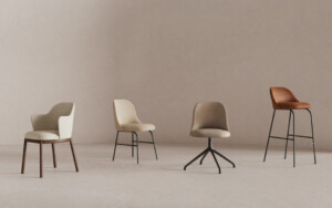 Collection of chairs against neutral background